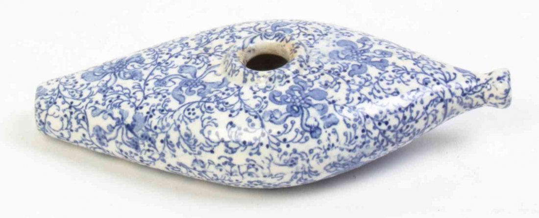 A Spode Baby Bottle, Width 8 inches.: A Spode Baby Bottle, 19TH CENTURY, with transfer printed blue and white decoration. Width 8 inches. Property from the Estate of Alice Lynne McKee, London, England and Lake Forest, Illinois