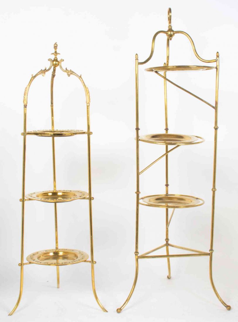 Two English Brass Dessert Stands, Height of taller 40: Two English Brass Dessert Stands, one having swing-out tiers. Height of taller 40 inches. Property from the Estate of Alice Lynne McKee, London, England and Lake Forest, Illinois