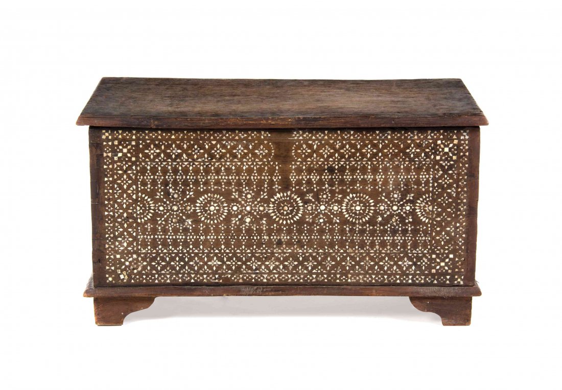 A Middle Eastern Mother of Pearl Inlaid Chest. Height: A Middle Eastern Mother of Pearl Inlaid Chest. Height 14 1/2 x width 26 1/4 x depth 13 1/8 inches.