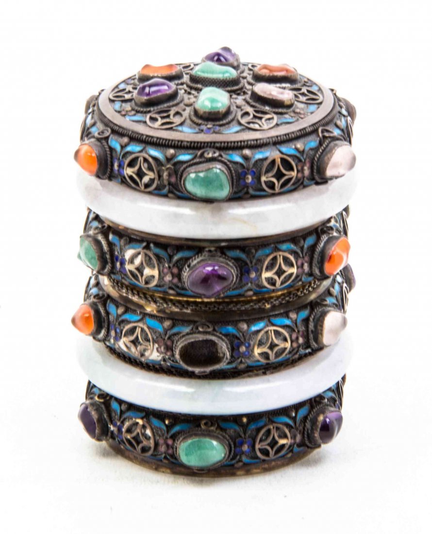 A Chinese Jade and Hardstone Mounted Silver Box and: A Chinese Jade and Hardstone Mounted Silver Box and Cover, of cylindrical form, ringed with hardstone inset and enameled bangles alternating with jadeite bangles, having a conforming cover. Diameter o
