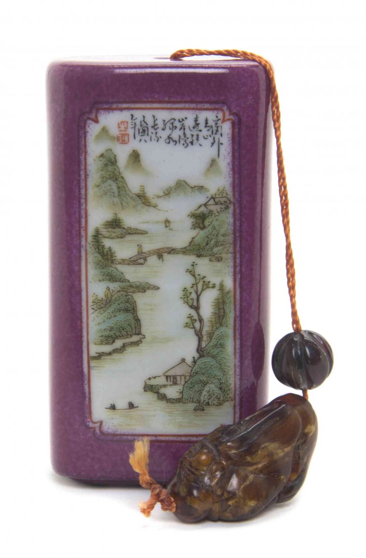 A Porcelain Painted Inro, Height 3 1/4 inches.: A Porcelain Painted Inro, with Chinese style landscape painting, with an amber ojime and a netsuke in the form of Hotei. Height 3 1/4 inches. Property from the Collection of James S. Frankenberger, Do