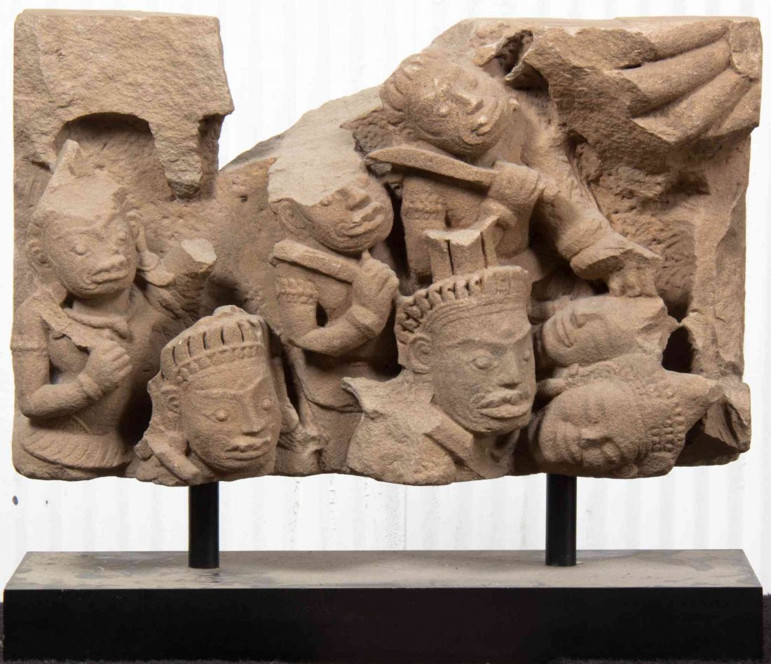 A Cambodian Carved Sandstone Fragment, Width 22 inches.: A Cambodian Carved Sandstone Fragment, depicting several figures. Width 22 inches. Property from the May Weber, M.D., Collection, Chicago, Illinois to benefit the May Weber Anthropology Study Center a