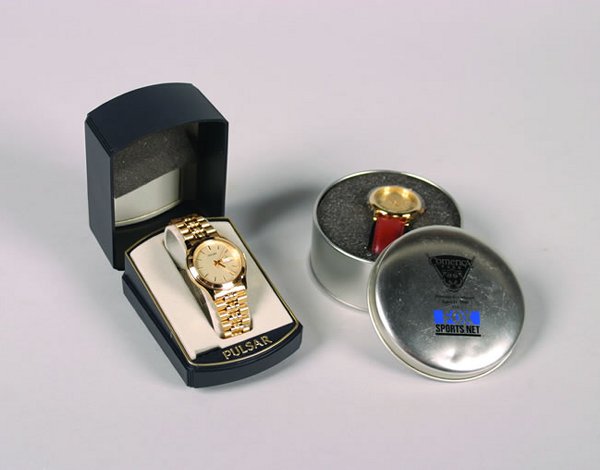 A Pulsar Watch, inscribed "Detroit Tigers, 15th A: A Pulsar Watch, inscribed "Detroit Tigers, 15th Anniversary, 1984 World Championship, July 25, 1999," together with a Sweda watch and tin commemorating opening day of Comerica Park, April 11, 2000.Hei