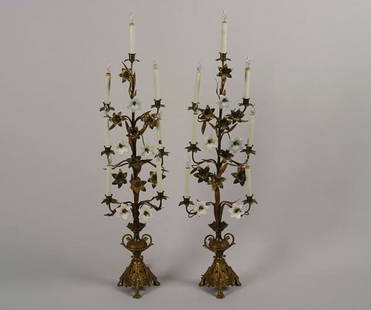 A Pair of Austrian Gilt Metal Seven-Light Candelabr: decorated with white glass flowers.Height 46 inches.