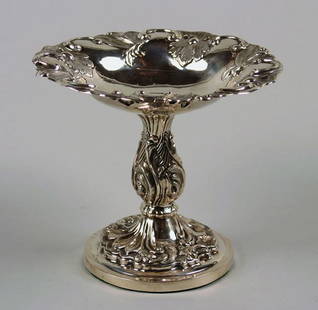 A Continental Silver Compote,: chased with swags, flowers and fruit, inscribed Minne af 8 de Augusti, 1854.Height 6 1/8 inches.