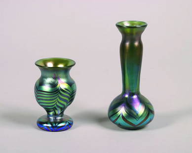 Two Orient and Flume Blue Irridescent Glass Vases,: decorated with swirl motif.Height 6 inches.