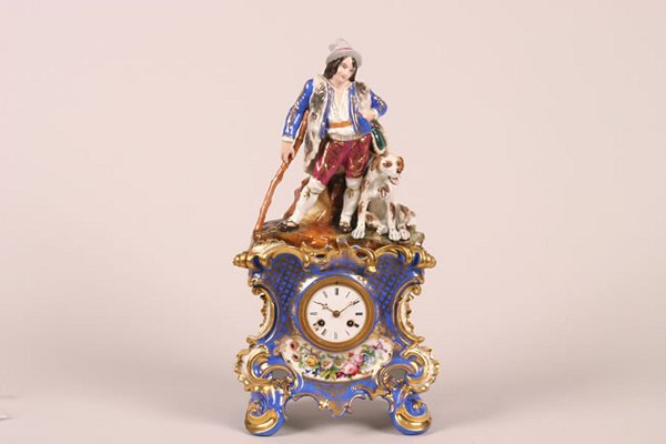 A French Two-Piece Porcelain Mantel Clock under G