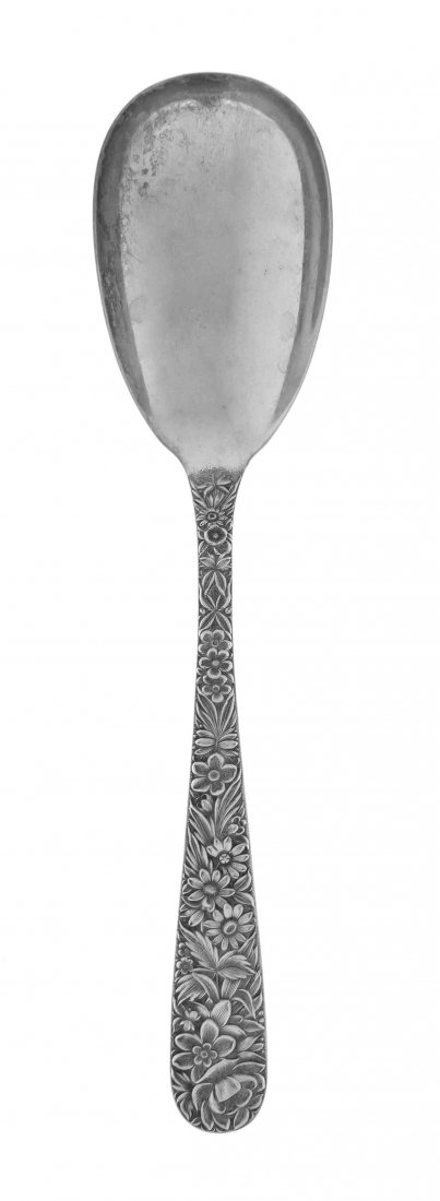 An American Silver Serving Spoon, S. Kirk & Son Inc.,: An American Silver Serving Spoon S. Kirk & Son Inc., Baltimore, MD, Circa 1930 Repousse pattern marked on reverse of handle 3 ozt 8 dwt Length 9 1/2 inches