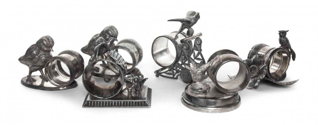 A Group of Six American Silver-Plate Figural Napkin: A Group of Six American Silver-Plate Figural Napkin Rings with Birds Various Makers, Late 19th/Early 20th Century comprising two with finches on oval bases, Rogers, Smith & Co., Meriden, CT, one with 