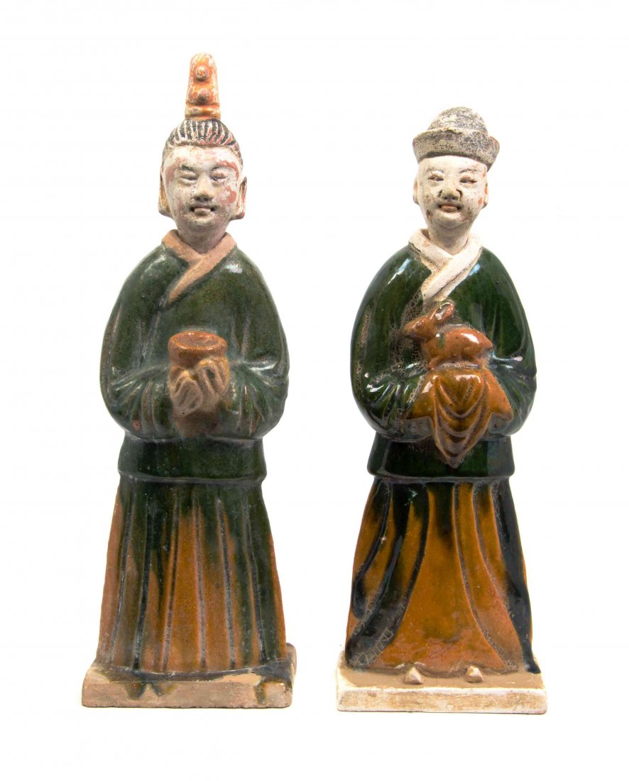 Two Tang Style Pottery Figures Height of taller 12 3/4: Two Tang Style Pottery Figures each depicting a standing robed figure, one bearing a bowl, the second holding a rabbit. Height of taller 12 3/4 inches. Property from the Estate of James J. McKiernan, 