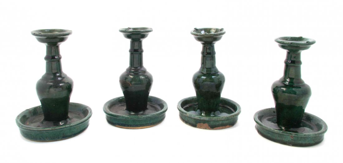 Four Chinese Ceramic Candlesticks Height 7 1/2 inches.: Four Chinese Ceramic Candlesticks each of baluster form with a circular dished base. Height 7 1/2 inches. Property from the Estate of James J. McKiernan, Kansas City, Missouri