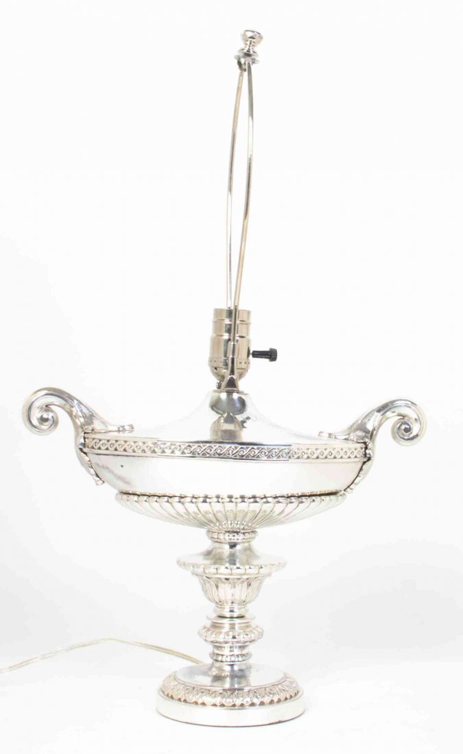 An English Silver-Plate Table Lamp Height 23 inches: An English Silver-Plate Table Lamp of urn form with a silk shade. Height 23 inches Property from the Estate of Alice Lynne McKee, London, England and Lake Forest, Illinois