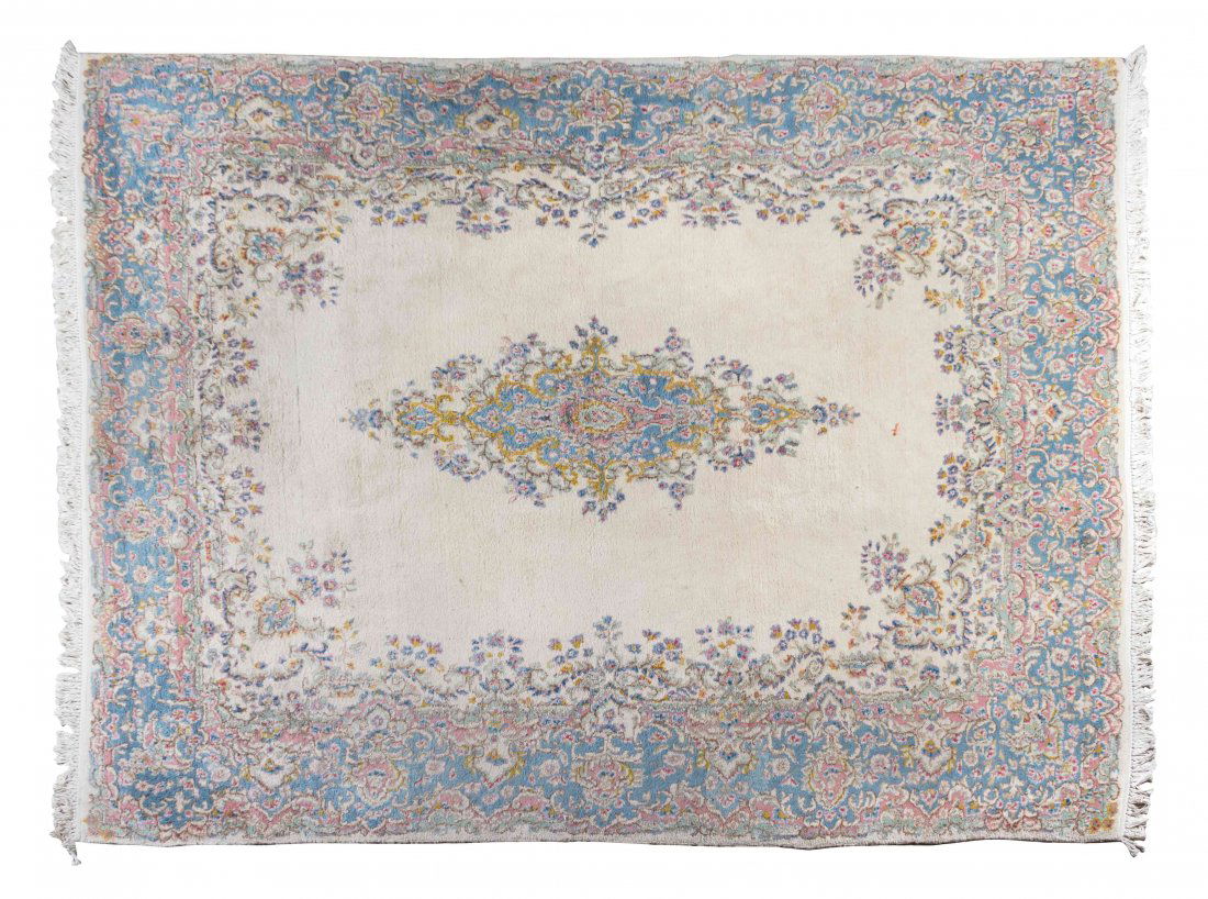A Kirman Wool Rug 9 feet 10 inches x 7 feet 11 inches.: A Kirman Wool Rug 9 feet 10 inches x 7 feet 11 inches. Property from the Estate of a Chicago Area Collector