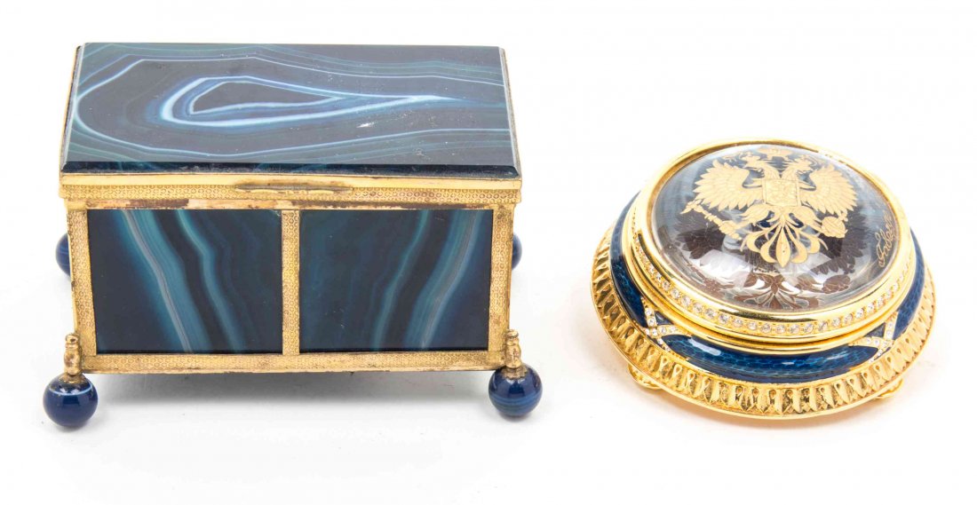 Two Desk Articles Diameter of paperweight 3 3/8 inches.: Two Desk Articles comprising a gilt metal mounted agate casket and an Igor Carl Faberge paperweight. Diameter of paperweight 3 3/8 inches.