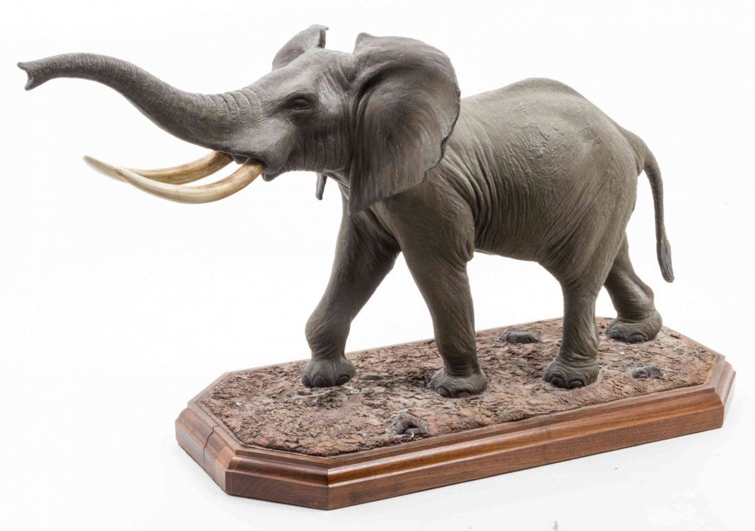 A Jonas Studios Animalier Sculpture Length overall 31: A Jonas Studios Animalier Sculpture 20TH CENTURY depicting a striding elephant. Length overall 31 1/2 inches.