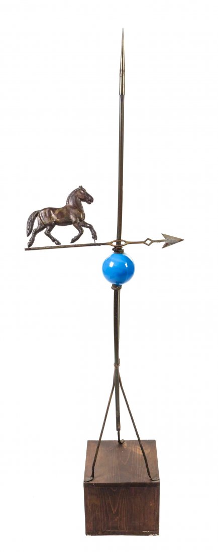 An American Iron Weathervane Height overall 70 1/2: An American Iron Weathervane in the form of a horse, raised on a tripod stand. Height overall 70 1/2 inches. Property from the Collection of Herb and Roberta Nechin, Chicago, Illinois