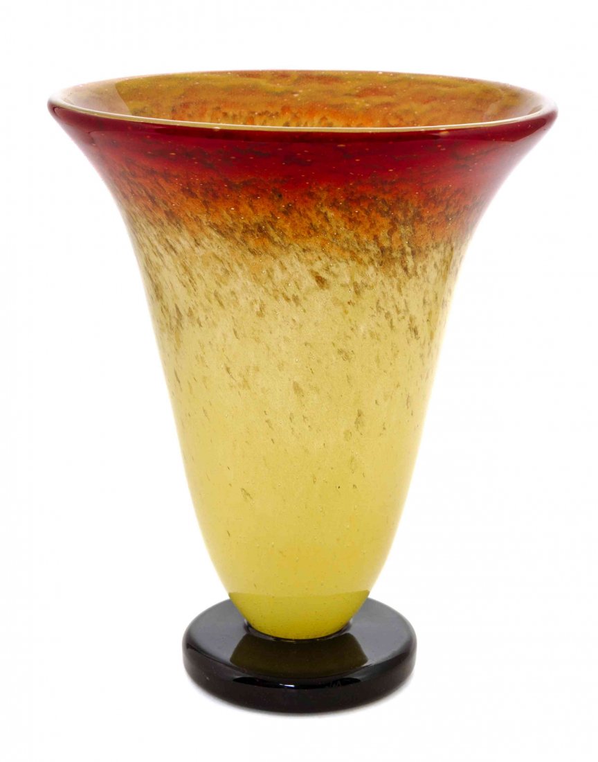 A Charles Schneider Glass Vase Height 8 inches.: A Charles Schneider Glass Vase of tapering form, with a red to yellow mottled ground, raised on a circular foot, etched Schneider France. Height 8 inches.