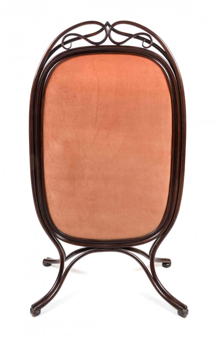A Thonet Style Mahogany Bentwood Firescreen Height 55: A Thonet Style Mahogany Bentwood Firescreen having an oval screen within a bentwood frame raised on pad feet. Height 55 inches.