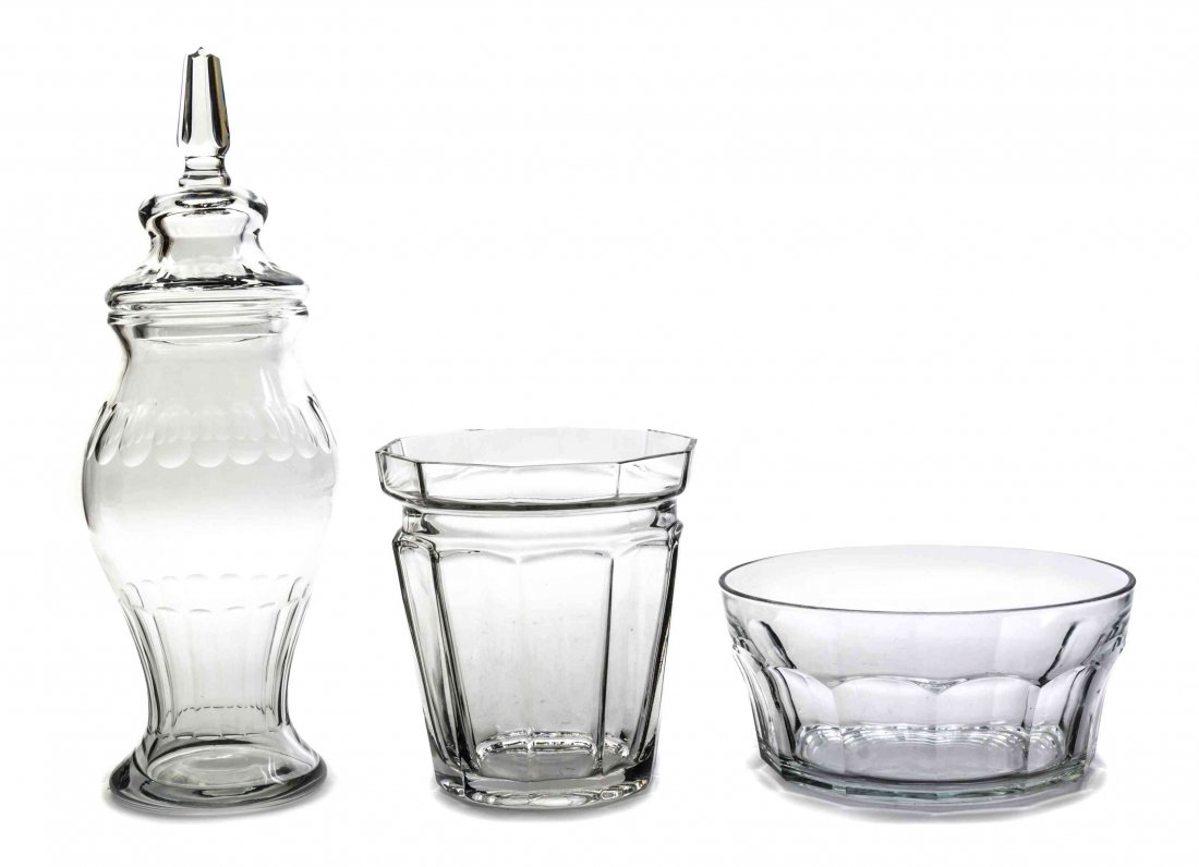 An English Cut Glass Jar and Cover Height of first 18: An English Cut Glass Jar and Cover of baluster form, together with a faceted glass bowl and vase. Height of first 18 1/4 inches. Property from the Estate of James J. McKiernan, Kansas City, Missouri