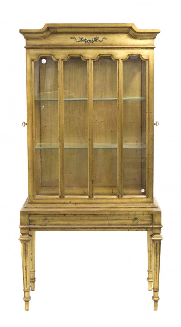 A Neoclassical Giltwood Vitrine Height 66 x width 32 x: A Neoclassical Giltwood Vitrine having a stepped cornice over the glazed front and sides, further set with mounted sides. Height 66 x width 32 x depth 14 inches.