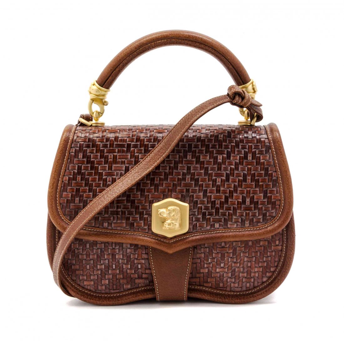 A Barry Kieselstein-Cord Brown Woven Leather Bag, 9 x 7: A Barry Kieselstein-Cord Brown Woven Leather Bag, brushed gilt-metal dog collar hardware on handle and dog clasp, hard handle with detachable shoulder strap, 9 x 7 x 3 3/4 inches. Property from the Es