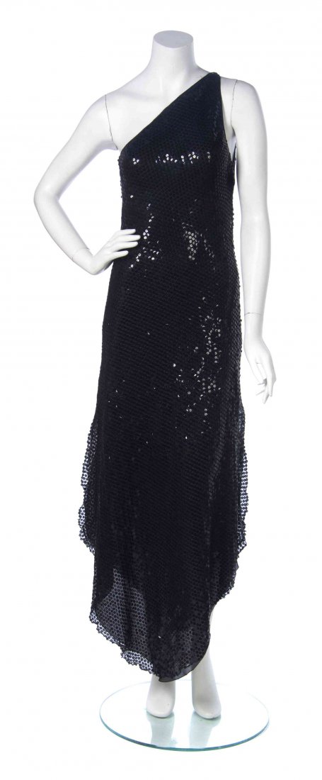 A Halston Black Sequin Gown,: A Halston Black Sequin Gown, circa 1980, one shoulder with an asymmetric side split hem, fully lined. Labeled: Halston. Condition: Measurements: Bust: 13 1/2" flat Waist: 14" flat Hip: 16" flat Overal
