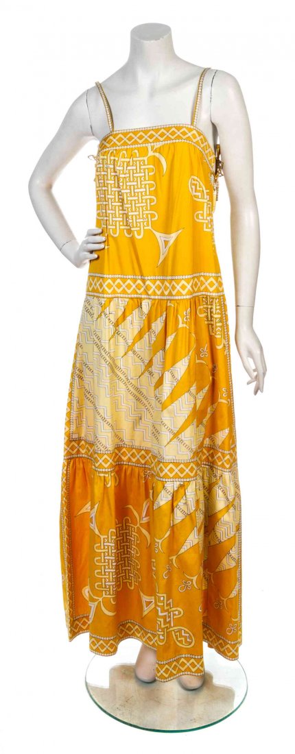 An Emilio Pucci Marigold Cotton Print Sundress,: An Emilio Pucci Marigold Cotton Print Sundress, camisole straps, self-ties to the sides, tiered skirt. Labeled: Emilio Pucci. Property from the Estate of Shirley Ann Kritzik, Milwaukee, Wisconsin Cond