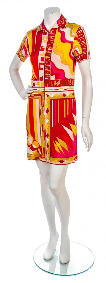 An Emilio Pucci Red and Yellow Print Silk Knit Jersey: An Emilio Pucci Red and Yellow Print Silk Knit Jersey Shirt Dress, 1960s, short sleeves, with a center front zipper closure. Labeled: Emilio Pucci. Size 6. Property from the Estate of Shirley Ann Krit