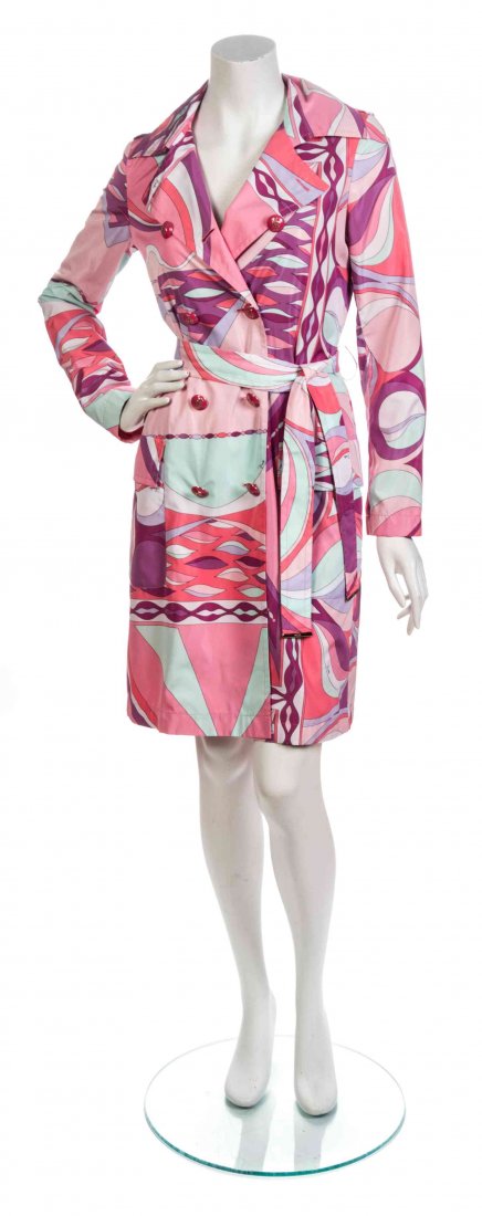 An Emilio Pucci Pink Print Poly Raincoat,: An Emilio Pucci Pink Print Poly Raincoat, double breasted with bold pink crown insignia buttons, epaulets at the shoulders, two patch pockets and a self-belt. Labeled: Emilio Pucci. Property from the 