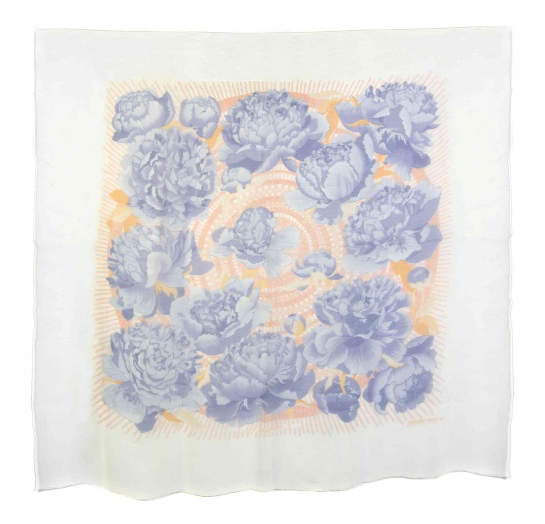 An Hermes Silk Chiffon Scarf, 42 x 42 inches.: An Hermes Silk Chiffon Scarf, in a peony motif. Labeled within print: Hermes. 42 x 42 inches. Property from the Collection of a Lady, New York and London Condition: Overall excellent condition. Comes