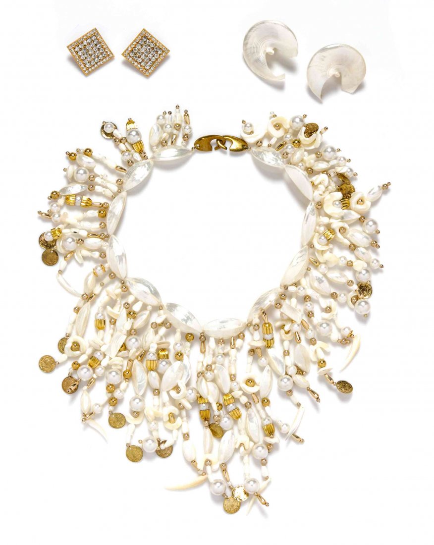 A Gerda Lynggaard for Monies Mother of Pearl Demi: A Gerda Lynggaard for Monies Mother of Pearl Demi Parure, comprised of a fringe necklace together with a pair of matching earclips, and a pair of pave rhinestone earclips. Stamped: Gerda Lynngaard Mon
