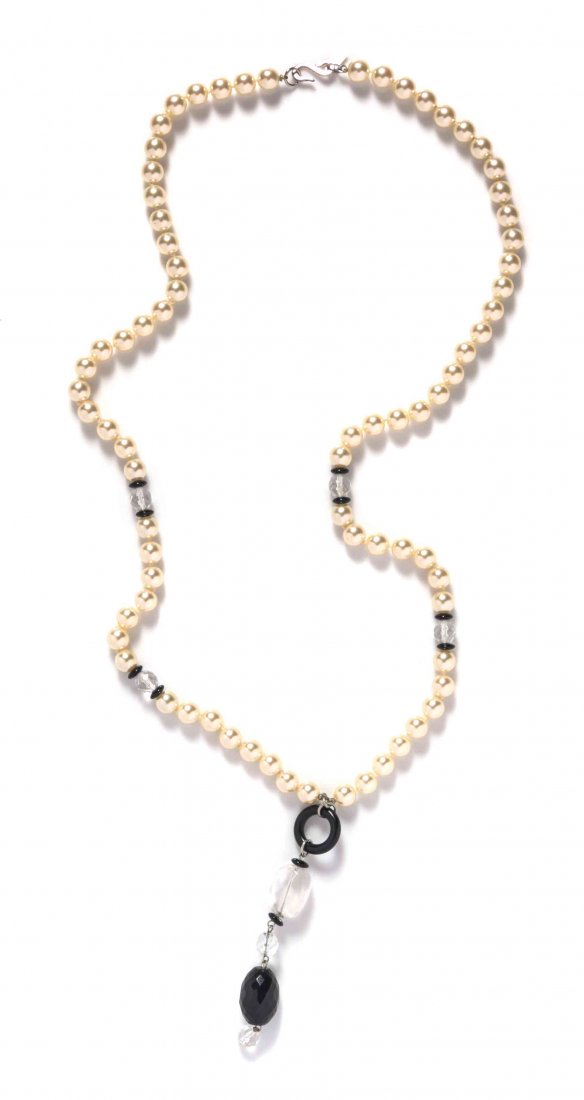 A Kenneth Jay Lane Faux Pearl Necklace,: A Kenneth Jay Lane Faux Pearl Necklace, comprised of two matching necklaces each with faux jet beads, together with a faux pearl necklace with faceted faux jet and clear stones. One necklace is stampe