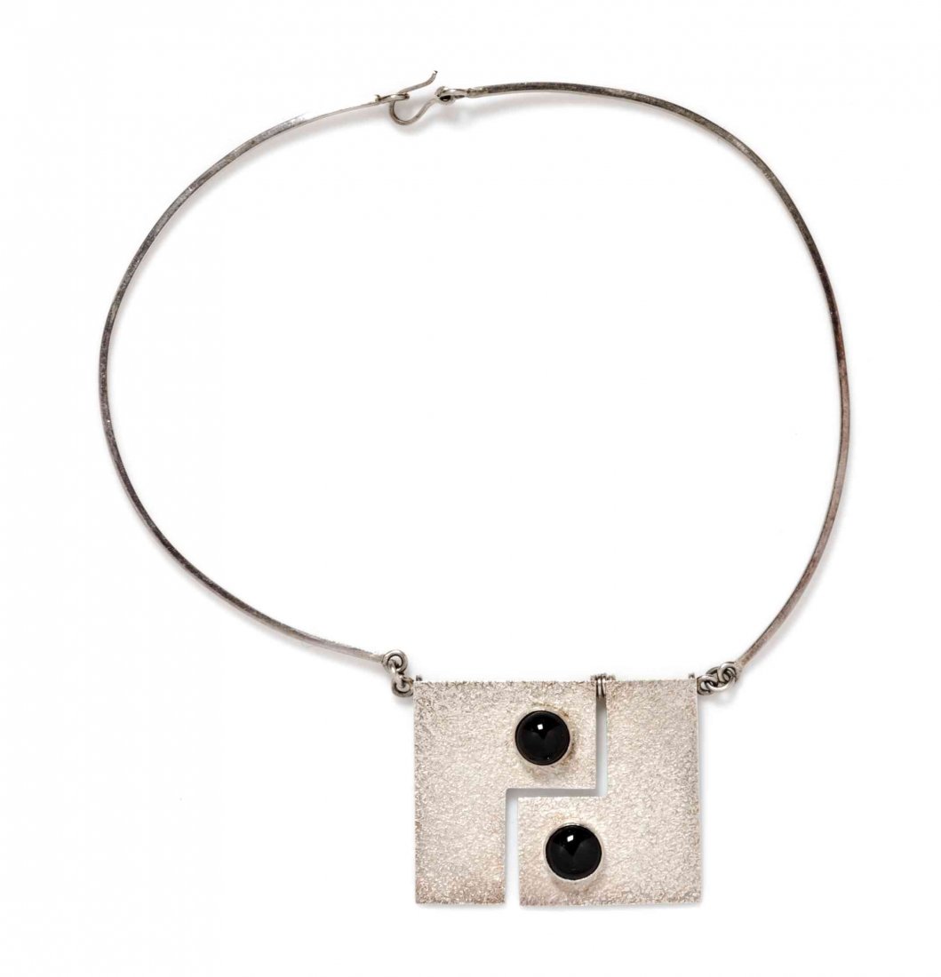An Oswaldo Guayasamin Silvertone Modernist Kinetic: An Oswaldo Guayasamin Silvertone Modernist Kinetic Necklace. Stamped: Guayasamin. Property from the Collection of Dana Mordini, Tahoe City, California