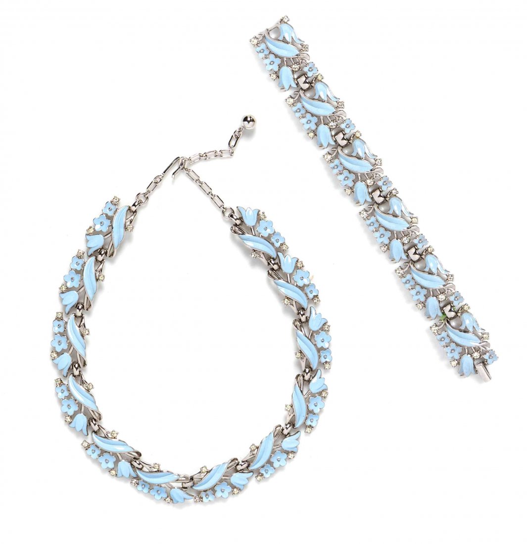 A Trifari Pastel Blue Enamel and Rhinestone Floral Demi: A Trifari Pastel Blue Enamel and Rhinestone Floral Demi Parure, comprised of a choker necklace and a bracelet. Each stamped: Triffari. Property from the Collection of Dr. Perlita Campbell, Evanston, I