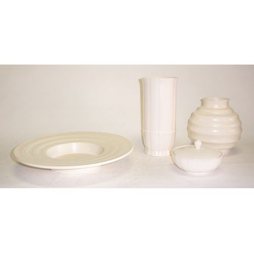 KEITH MURRAY FOR WEDGWOOD POTTERY Glazed ceramic;: KEITH MURRAY FOR WEDGWOOD POTTERY Glazed ceramic; four white pieces, including two vases, one with foot fracture, the other repaired, a covered dish, and a bowl. Vases Hts: 7 1/2, 10 1/8; dish H: 3 1/
