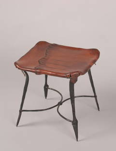 A Wrought Iron and Leather Lined Stool,: designed by Sido and Francois Thevenin for Sawaya & Moroni.Height 16 1/2 inches.