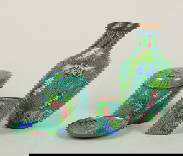 A Chinese Four Piece Cloisonné Smoking Set, Heigh: A Chinese Four Piece Cloisonné Smoking Set, comprising a vase, a covered jar, a match box and an ash receiver. Height of vase 6 5/8 inches.