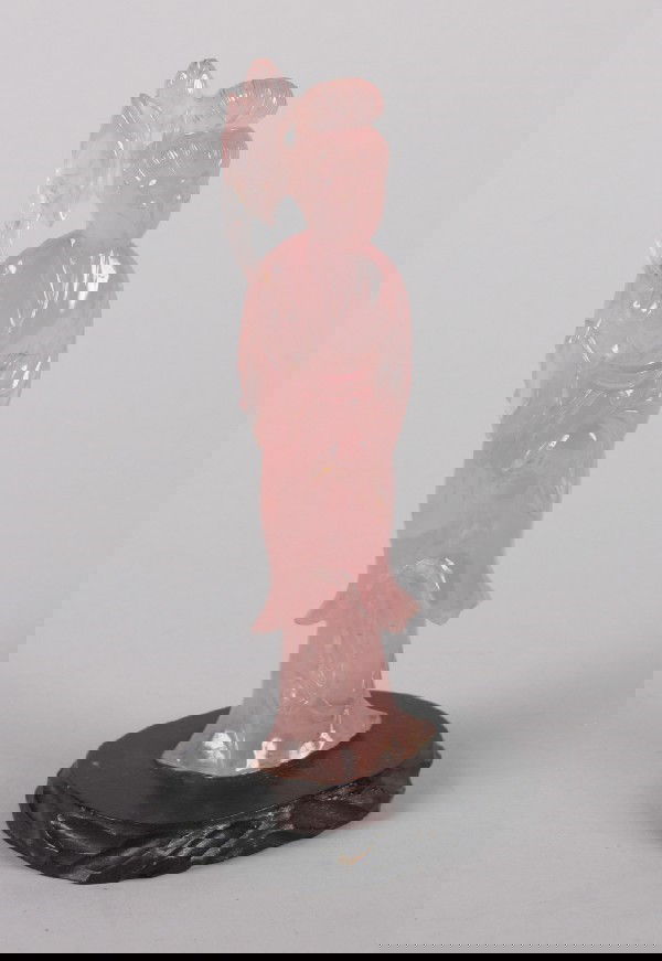 A Chinese Rose Quartz Figure of a Meiren,: A Chinese Rose Quartz Figure of a Meiren, 20th century, dressed in flowing robes and carrying a peony spray.