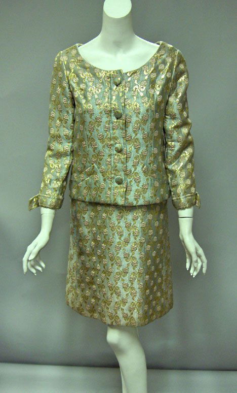 Christian Dior Couture silk jacquard skirt suit,: Christian Dior Couture silk jacquard skirt suit 1960s Woven with pink roses and gold bows on a robin's egg-blue ground, boxy jacket with wide curved neckline and fabric covered buttons, the skirt matc
