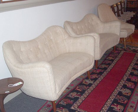 MODERN- DESIGN PARLOR SET 20th c. Consisting of t: MODERN- DESIGN PARLOR SET 20th c. Consisting of two matching settees and one armchair, all with white uphostery and tapering legs. H: 33, L: 50, D: 30 in.