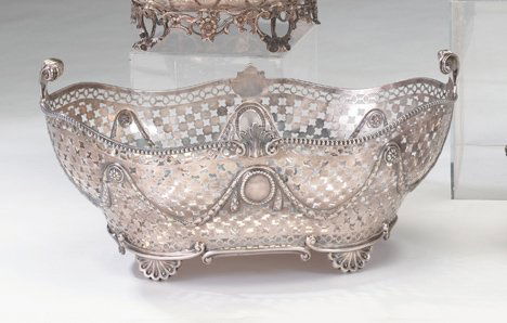 Victorian sterling silver reticulated basket, cha: Victorian sterling silver reticulated basket charles stuart harris, london 1893 The serpentine bead molded rim centered by shell motifs and with twin scroll handles, the pierced sides with vacant cart