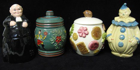 Group of Decorative Porcelain and Pottery, , Incl: Group of Decorative Porcelain and Pottery Including a Roseville pitcher, Austrian beverage set, moose creamer, priest, clown and candy decorated cookie jars and a small 5 piece wash set. H: of cookie