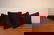 502B: A Group of Four Chenille Throw Pillows,
