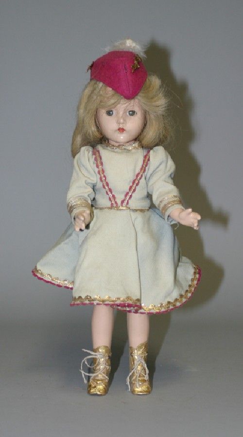 A Composition Effanbee Anne Shirley, Height 14 in: A Composition Effanbee Anne Shirley, 1930's, comprising original outfit, shoes, and hat. Height 14 inches.