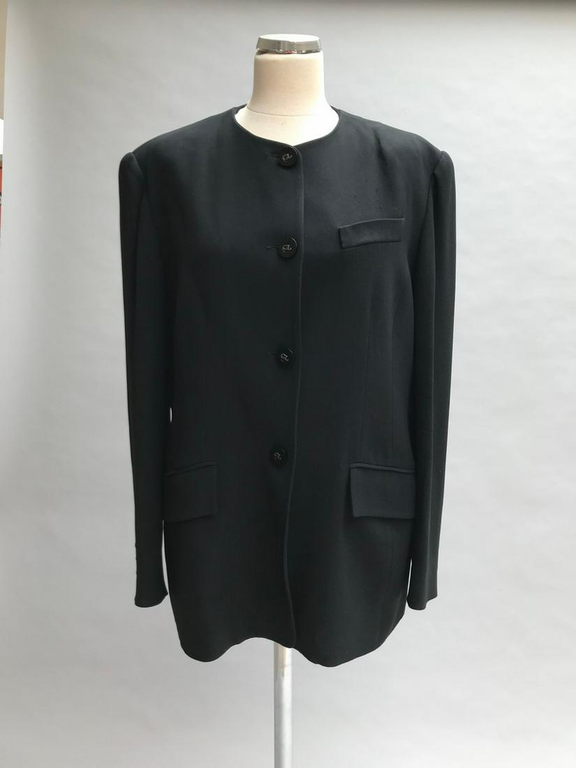 GUY LAROCHE VESTE en laine bleu marine.T.46. Excellent: GUY LAROCHE VESTE en laine bleu marine.T.46. Excellent état.