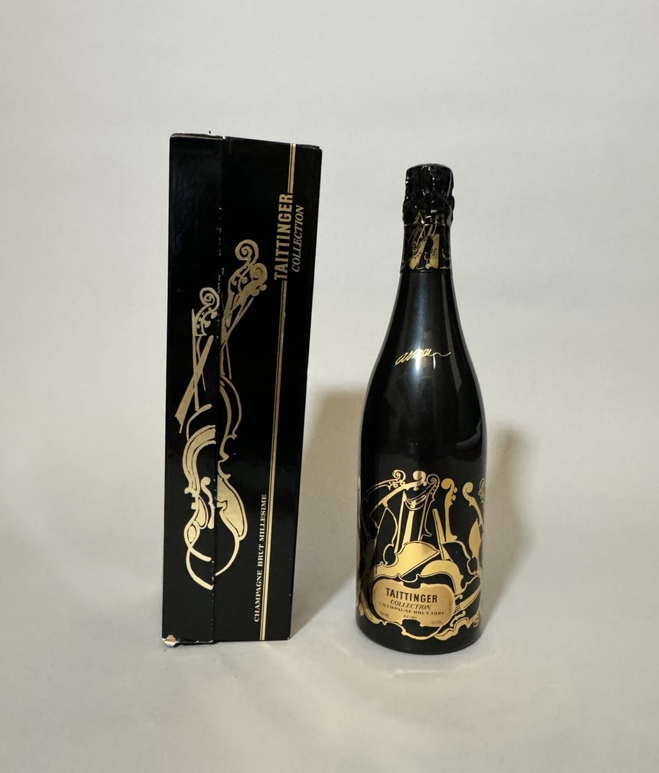 André MASSON (1896-1987) & TAITTINGER: André MASSON (1896-1987) & TAITTINGER Bouteille de Champagne. Collection Millésime 1982, 750ml. Bouteille et coffret décorés par André MASSON (1896-1987) (dans son coffret d&#