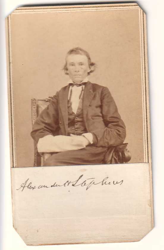 (CIVIL WAR.) STEPHENS, ALEXANDER. Photograph w: (CIVIL WAR.) STEPHENS, ALEXANDER. Photograph with a clipped Signature mounted recto at the bottom of the image, carte-de-visite seated portrait by Alexander Gardner, on the original mount; corners cli