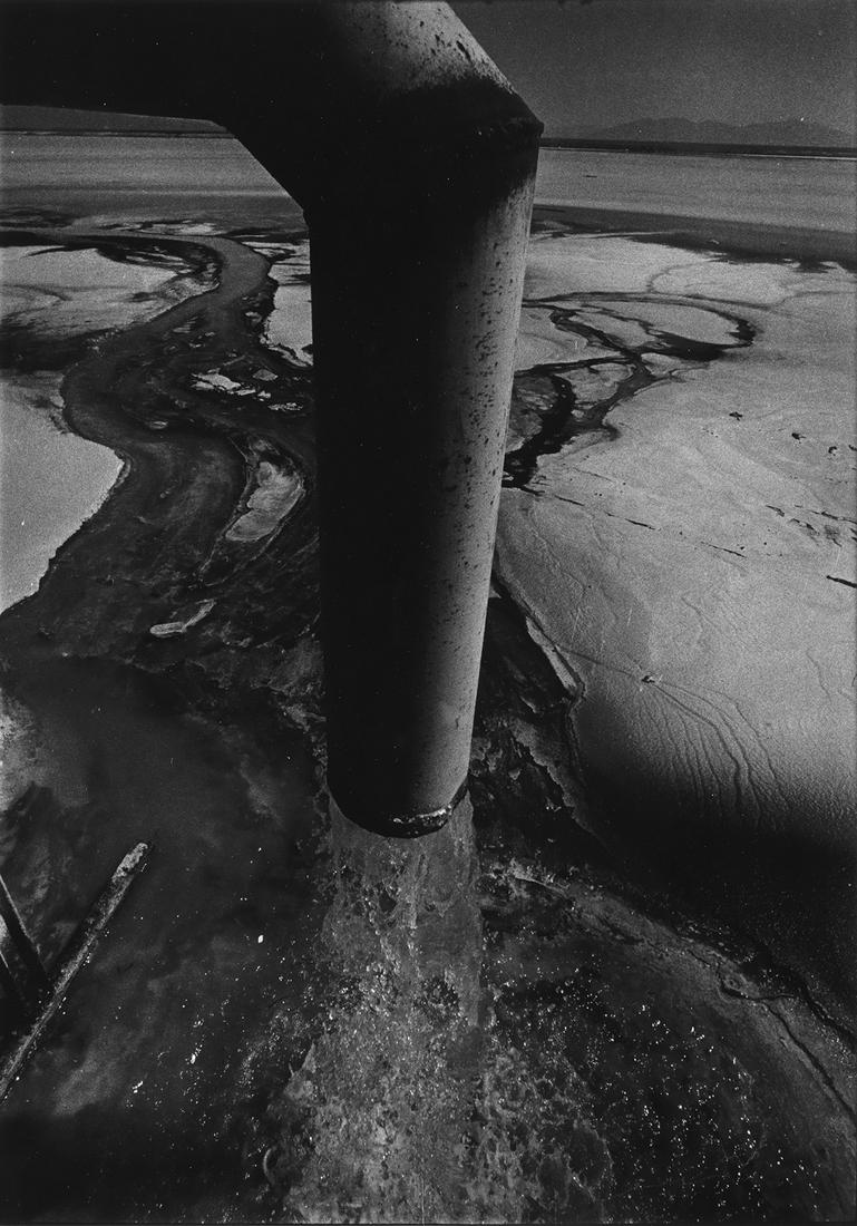 W. EUGENE SMITH (1918-1978) Chisso Factory conduit: W. EUGENE SMITH (1918-1978) Chisso Factory conduit pipe, Minamata. Silver print, the image measuring 13x9 inches (34x23.8 cm.), the sheet 14x11 inches (35.6x27.9 cm.), with a notation, in pencil, on r