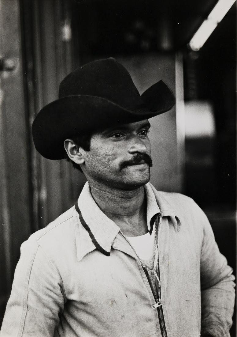 DAVID WOJNAROWICZ (1954-1992) Times Square Cowboy.: DAVID WOJNAROWICZ (1954-1992)Times Square Cowboy. Silver print, the image measuring 241.3x171.5 mm; 9½x6¾ inches, the sheet slightly larger. 1980s.Provenance: From the Estate of Brian Butter