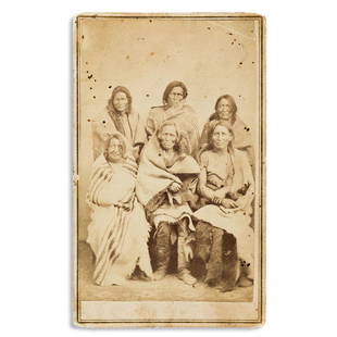 (AMERICAN INDIANS--PHOTOGRAPHS.) Nicholas Brown.: (AMERICAN INDIANS--PHOTOGRAPHS.) Nicholas Brown. Carte-de-visite of a group of 6 Taos Puebloans, printed in Mexico. Albumen photograph, 3½ x 2¼ inches, on original mount with photographer's